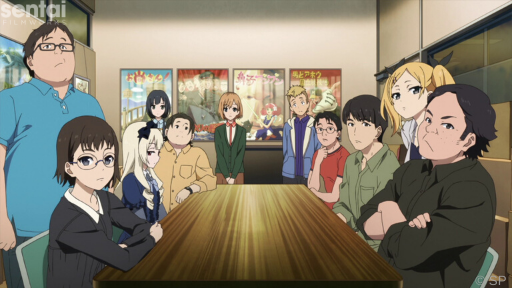 The cast of Shirobako looks toward the camera during an office meeting.