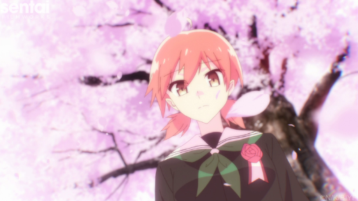 Yuu gazes forlornly at the ground in front of a backdrop of falling sakura petals.