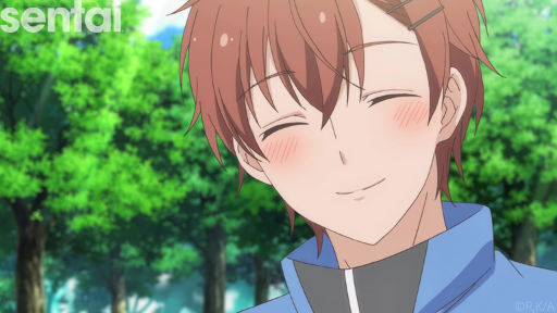 Kijima looks at the camera and smiles, blush adorning his cheeks.