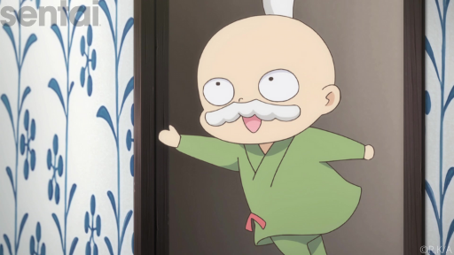 Ao's father, a short, bald man wearing a green robe, skips happily through a door.
